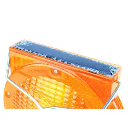 Reflector LED naranja para señalización y seguridad en instalaciones eléctricas y obras.